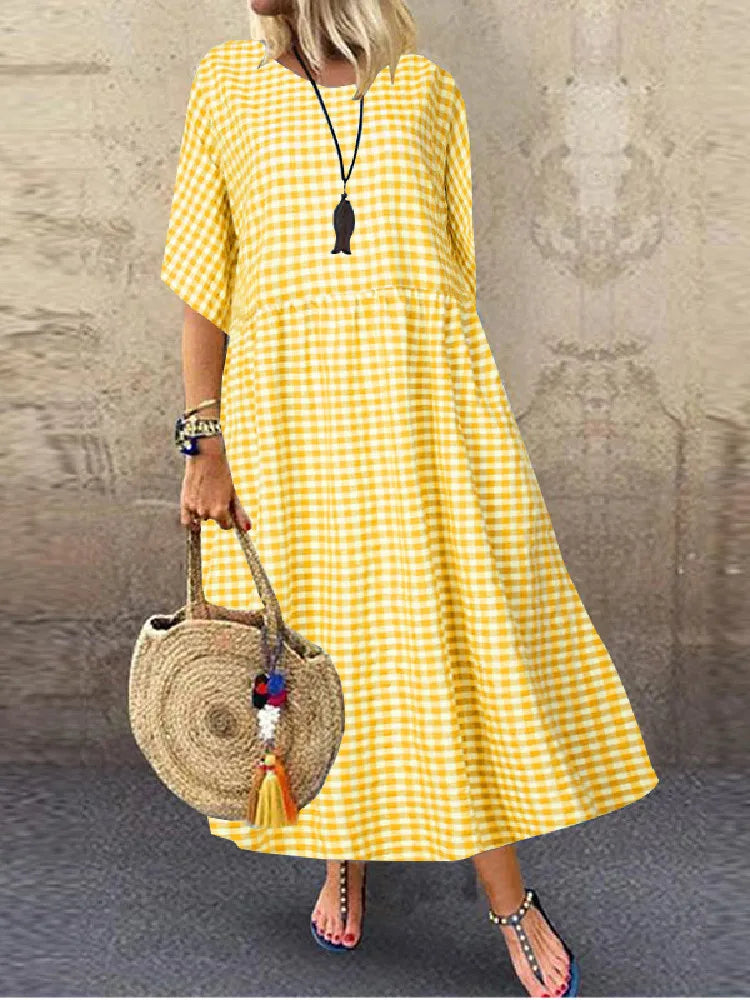 Carine - Elegantes gepunktetes Kleid