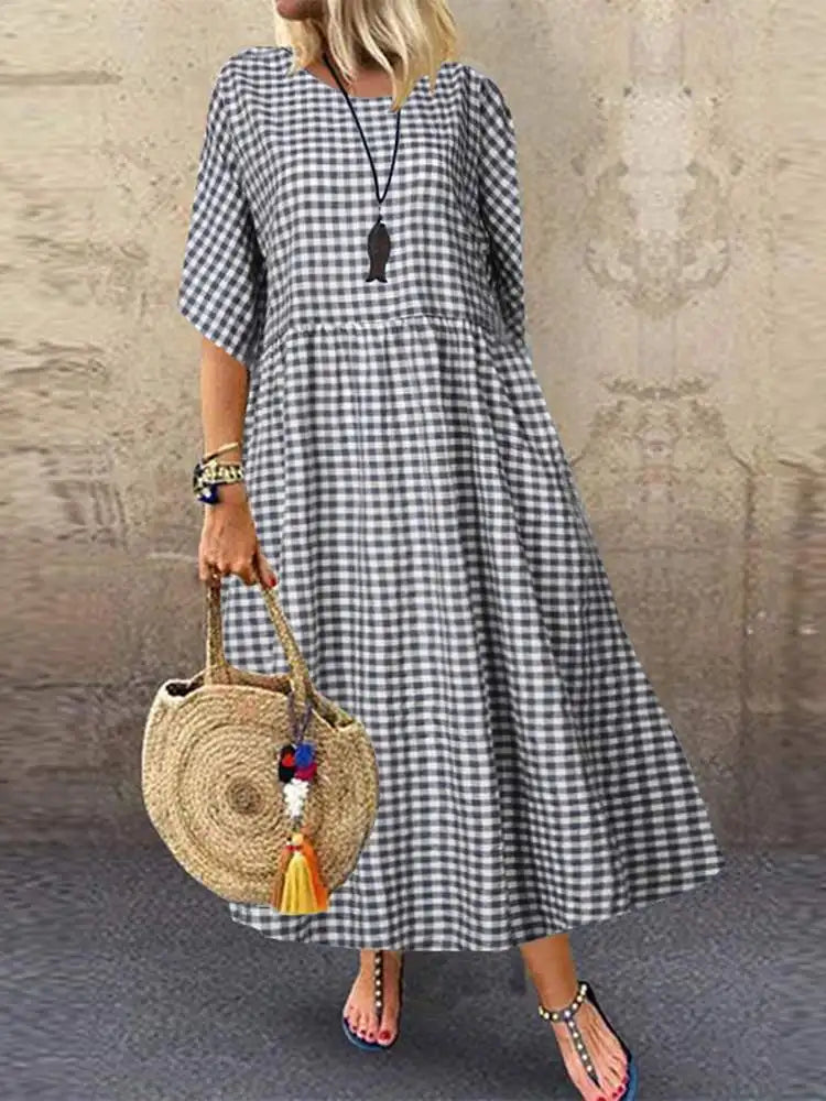 Carine - Elegantes gepunktetes Kleid