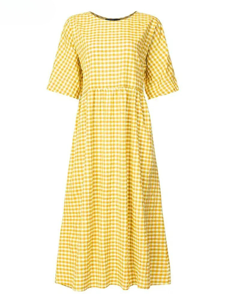 Carine - Elegantes gepunktetes Kleid