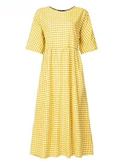 Carine - Elegantes gepunktetes Kleid